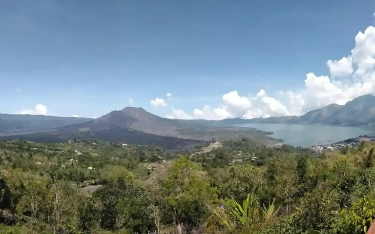 Mount Batur and its crater lake seen from Kintamani