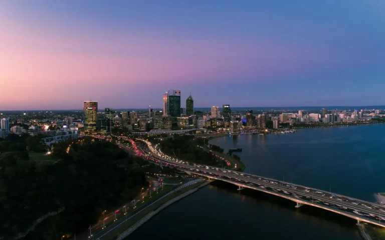 Perth city skyline and the Swan River at dusk