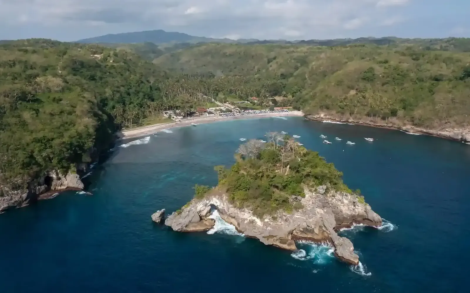 Aerial view of Crystal Bay and its rocky islet on Nusa Penida